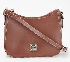 A stylish, straightforward design combined with plenty of interior organization means you'll carry this crossbody for seasons to come. From Dooney & Bourke. Interior Organization, Handbags Crossbody, American Leather, Quilted Leather, Dooney Bourke, Vintage Leather, Fashion Handbags, Belt Bag, Pebbled Leather