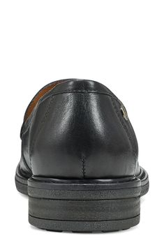 A low stacked heel and minimalist design refine this moc-toe leather loafer outfitted with a cushy, orthotic-friendly insole. 1" heel Removable, cushioned insole with arch support Leather upper/synthetic and textile lining/synthetic sole Imported Leather Closed Toe Slip-ons For Business Casual, Slip-on Swift Leather Shoes For Work, Slip-on Oxfords With Ortholite Insole For Work, Slip-on Swift Leather Workwear Shoes, Swift Leather Slip-on Shoes For Work, Leather Footbed Flats For Work With Plain Toe, Business Slip-ons With Swift Leather And Round Toe, Workwear Flats With Leather Footbed And Plain Toe, Leather Shoes With Cushioned Footbed For Work