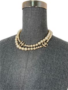 We the ity of this rare Chanel CC Logo Timeless Classic Faux Pearl Necklace crafted from graduated?ÿwhite faux pearls?ÿand gold-tone hardware. Featuring signature 'CC' encrusted logo's and a lobster clasp closure. Wear this?ÿversatile necklace long or doubled! Condition:?ÿExcellent.?ÿOverall like-new. All pearls and encrusted 'CC' logos are in-tact and perfect. Graduating faux pearls?ÿ Gold-tone metal hardware 17'' drop?ÿ Total?ÿlength, 34'' 'CC' logos, 0.75'' Shopping Chanel, Necklace Craft, Ball Pendant, Faux Pearl Necklace, Necklace Long, Prada Crossbody Bag, Timeless Handbag, Cc Logo, Girl Backpacks