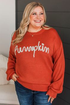 Fit & Details: Oversized, relaxed fit. If in-between sizes, you could size down. Soft knit material with an embroidered "pumpkin" detail along bust Round neckline Drop shoulder sleeves Measurements: Small: Bust 46“ Length 25“ Medium: Bust 48“ Length 26“ Large: Bust 50“ Length 27“ Fabric & Material Care: Hand wash cold. Hang or line dry. 100% Acrylic. *Imported* Model Info: Leah is modeling a large. Britta is modeling a small. Casual Halloween Knit Sweater, Embroidered Knit Tops For Fall, Fall Cotton Orange Sweater, Embroidered Crew Neck Sweater For Fall, Embroidered Long Sleeve Sweater For Fall, Casual Embroidered Sweater For Fall, Orange Knit Tops For Fall, Embroidered Pumpkin, Sweater Pumpkins