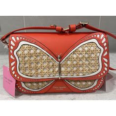 This Bag Is Gorgeous And Very Collectible. 100% Authentic Kate Spade Butterfly Smooth Medium Shoulder Bag Buddie Butterfly Cabana Limited Edition. Brand New With Tags And Original Pink Dust Bag. Locking Mechanism Still Has Protective Clear Film. Msrp $358 5.5"H X 8.75" W X 3"D Strap Drop: 18.5” Smooth Leather With Caning Trim Faux Lambskin Leather Lining Pinmount Logo Shoulder Bag With Push-Lock Flap Closure Interior Card Slot Interior Zip Pocket Back Slip Pocket Optional (And Adjustable) Webbin Spring Orange Leather Bags, Orange Leather Bags For Summer, Summer Orange Crossbody Shoulder Bag, Orange Crossbody Shoulder Bag For Summer, Spring Orange Crossbody Bag, Orange Shoulder Bag With Adjustable Strap For Spring, Locking Mechanism, Kate Spade Bag, Lambskin Leather