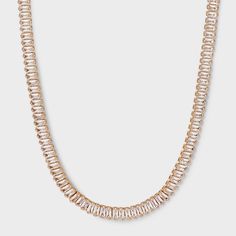 This necklace is the perfect accessory for any occasion. Whether it’s a formal event, a business meeting, or a casual gathering with friends, the Gold Baguette Stone Chain Necklace transitions effortlessly. It’s a versatile piece that can be worn alone for a minimalist look or layered with other necklaces to create a bold statement. The fold over clasp is not only a functional addition but also a stylish one. Its design ensures that your necklace stays securely in place, whether you’re dancing t Classic Party Chain Necklace, Trendy Evening Jewelry With Chain Strap, Elegant Party Necklace With Delicate Chain, Formal Rose Gold Metal Chain Necklace, Classic Chain Necklace With Adjustable Chain For Party, Classic Party Chain Necklace With Adjustable Chain, Gold Rhinestone Clavicle Chain Necklace For Formal Occasions, Classic Party Necklace With Adjustable Chain, Elegant Evening Chain Necklace With Adjustable Chain