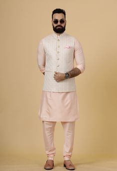 Important Instrucitons : We request you to kindly calculate the processing time of your order  after the mutual confirmation on Bespoke measurements between us has taken place (either via message , e mail or form) "Crafted with Passion in India; loved by men across the USA, Canada, Europe" Product Specifications : Material: Thread Embroidered Silk Color: Peach Jacket with Peach Kurta Payjama Collar type: Mandarin Jawahar Jacket With 6 Buttons in Front Package contents: 1 Half Jodhpuri Jacket + 1 Pink Chanderi Sherwani For Eid, Bollywood Style Pink Bandhgala With Chikankari Embroidery, Festive Pink Chanderi Sherwani, Festive Pink Chanderi Nehru Jacket, Pink Chanderi Sherwani With Zari Work, Pink Chanderi Sherwani For Wedding, Pink Chanderi Sherwani With Resham Embroidery, Pink Cutdana Bandhgala For Festive Occasions, Festive Embroidered Peach Sets