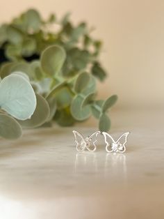 ✨ Sterling Silver Butterfly Stud Earrings ✨ Add a touch of elegance to your style with these stunning butterfly stud earrings crafted from high-quality 925 sterling silver. These beautiful and delicate butterfly earrings combine a minimalist design with timeless appeal, making them the perfect accessory for any occasion. Whether you're looking to dress up for a special event or add a subtle sparkle to your everyday look, these earrings are a must-have for every jewellery collection. 🌿 Why You'l Butterfly Symbolism, Butterfly Stud Earrings, Delicate Butterfly, Jewellery For Women, Minimalist Studs, Butterfly Earrings Stud, Earrings Elegant, Silver Butterfly, Earring Crafts