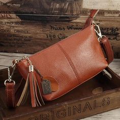 Leather Clutch Bag For Fall, Fall Leather Clutch Bag, Elegant Fall Pouch Bag, Fall Soft Leather Clutch Bag, Elegant Leather Clutch For Mobile Phone, Handheld Soft Leather Clutch, Leather Top Handle Clutch For Mobile Phone, Rectangular Leather Clutch For Fall, Saddle Handbags