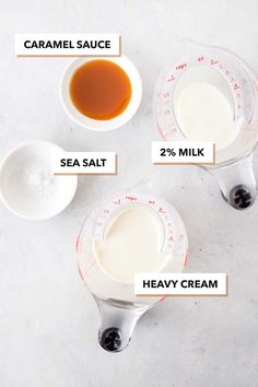 three measuring cups filled with different types of sauce