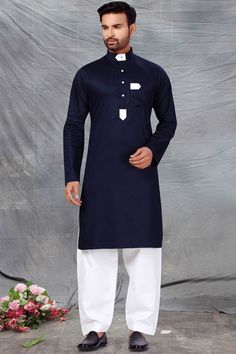 Product Features: Top Color: Navy Blue Bottom Color: White Work: Solid Top Fabric: Fine poly and cotton mix Bottom Fabric: Fine poly and cotton mix Pack Of: 1 Kurta : 1 Salwar Occasion: Partywear Disclaimer: There will be slight difference in digital to actual image Casual Blue Kurta For Festive Occasions, Blue Casual Kurta For Festive Occasions, Casual Blue Festive Kurta, Blue Casual Festive Kurta, Blue Festive Casual Kurta, Blue Cotton Winter Sets, Winter Cotton Blue Sets, Casual Blue Kurta For Eid, Blue Casual Kurta For Eid