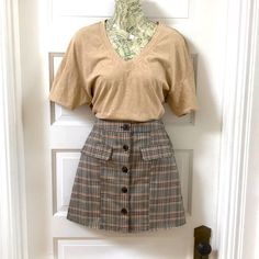 Nwt Urban Outfitters Size Small Mini Skirt Brown And Tan Plaid Light Academia. Flap Pockets! From Flat: Waist 14.5” Length In Front 16” 17” Length In Back. High Waist Beige Skort For Fall, Fall Beige Mini Skirt With Pockets, Beige Mini Skirt With Pockets For Fall, Casual Khaki Mini Skirt For Work, Casual Beige Skort For Fall, Beige Skort For Workwear In Fall, Casual Brown Mini Skirt For Work, Urban Outfitters Casual Mini Skirt For Fall, High Waist Lined Mini Skirt By Urban Outfitters