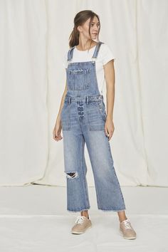 Pair with a cute jean jacket from a trendy denim on denim look. Denim Wide Leg Cropped Overall Distressed Detail Raw Hem Medium Wash Cotton Summer Utility Style Straight Leg Jumpsuits And Rompers, Medium Wash Cotton Denim Jumpsuit With Button Closure, Utility Style Washed Denim Jumpsuit With Straight Leg, High Rise Denim Utility Jumpsuits And Rompers, Everyday Dark Wash Overalls With Pockets, Utility High Rise Denim Jumpsuits And Rompers, Denim Overalls With Relaxed Fit, Utility High-rise Denim Jumpsuits And Rompers, Utility Straight Leg Jumpsuit With Relaxed Fit