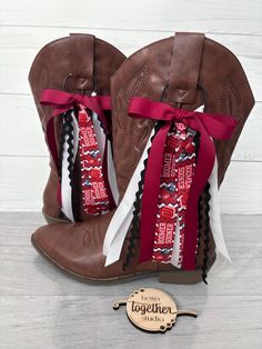 Elevate your boot game with our charming Boot Bows. These stylish accessories are designed to add a touch of elegance and personality to your favorite pair of boots. Made from high-quality materials, our Boot Bows are durable and easy to attach, giving your footwear a whole new look in seconds. Whether you're dressing up for a special occasion, headed to a game and wearing as team spirit or simply want to stand out on a casual day out, these bows are the perfect way to showcase your unique style. Available in a variety of colors and designs, there's a Boot Bow to suit every taste and outfit. Make a statement with your boots and let your individuality shine with our delightful Boot Bows! This is for a pair (both boots). Cowboy Western, Western Cowboy Boots, School Spirit, Western Cowboy, Team Spirit, Stylish Accessories, Western Boots, Boot Shoes Women, Game Day