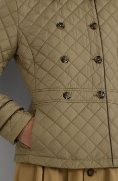 A polished third layer, this diamond-quilted fitted jacket features stylish details, faux-leather trim and lightweight fill for warmth without bulkiness. 24" length Double-breasted button closure Spread collar Button-tab cuffs On-seam pockets Epaulets Adjustable button back tabs Lined, with 100% polyester fill 100% recycled polyester Machine wash, tumble dry Made in China Winter Workwear Quilted Jacket With Diamond Quilting, Winter Diamond Quilted Outerwear For Work, Fitted Quilted Jacket With Padded Collar For Work, Diamond-quilted Outerwear For Fall Workwear, Diamond Quilted Outerwear For Work In Fall, Diamond Quilted Outerwear For Fall Workwear, Fall Workwear Outerwear With Diamond Quilting, Fitted Quilted Outerwear For Work, Quilted Fitted Outerwear For Work