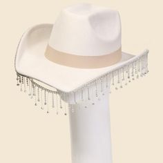 A Gorgeous Unique Must Have Trending Western Hat Has A Beautiful Rhinestone Fringe Western Hat Design. A Stunning Must Have For The Spring Season! This Item Is Sold In Packs Of 1. Adjustable Inner String This Item Is Made With: 90% Polyester 10% Alloy We Include A $1.75 Surcharge On This Item For Flat Rate Shipping Only. Made In China Label Labeled Halloween Jason, Mens Beanie Hats, Pom Pom Beanie Hat, Rhinestone Fringe, Men's Beanies, Western Hat, Graduation Hat, Black Balloons, Hat Design