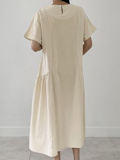 Leisure Solid Ruched Short Sleeve Round Neck Maxi Dress Casual Cotton Dresses With Gathered Waist, Casual Beige Dresses With Gathered Waist, Casual Solid Midi Dress With Gathered Waist, Casual Summer Midi Dress With Pleated Hem, Summer Casual Midi Dress With Pleated Hem, Relaxed Fit Ruched Knee-length Dress, Relaxed Fit Knee-length Ruched Dress, Ruched Relaxed Fit Knee-length Dress, Casual Relaxed Fit Midi Dress With Gathered Waist