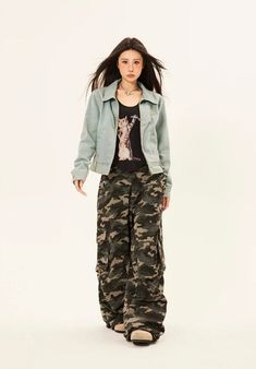 Embrace the essence of street style with our Camouflage Cargo Trousers, featuring bold double side belt straps for a blend of function and flair. Crafted from a soft yet durable blend of 95% cotton and 5% polyester fiber, these pants are tailored to thrive in your everyday wardrobe rotation. The classic camouflage pattern exudes a retro vibe, while multiple pockets and the loose fit cut ensure they are as practical as they are fashionable. Pair these trousers with a tucked-in basic tee and chunk