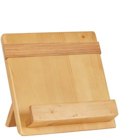 a wooden cutting board with a knife on it