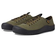 Teva Terra Canyon - Men's Shoes : Olive : Tackle any adventure in full comfort with the Teva Terra Canyon sneakers. Low top cut. Lace-up closures. Logo tag at side of uppers. Pull tabs on tongues. Toe cap design. Removeable insoles. round, closed toe silhouette. Textile uppers, linings, and insoles. Synthetic outsoles. Imported. Measurements: Weight: 11 oz Product measurements were taken using size 9.5, width D - Medium. Please note that measurements may vary by size. Weight of footwear is based Casual Closed Toe Walking Shoes With Vibram Sole, Outdoor Low-top Walking Shoes In Econyl, Low-top Econyl Walking Shoes For Outdoor, Econyl Walking Shoes With Rubber Sole For Outdoor, Econyl Walking Shoes With Rubber Sole For Outdoor Activities, Casual Slip-on Hiking Sneakers, Lightweight Outdoor Sneakers, Comfortable Slip-on Hiking Sneakers, Lightweight Outdoor Sneakers With Round Toe