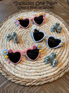 "Fun heart-shaped sunglasses with flowers in the corners are perfect for any bachelorette Party, Birthday Party, or any day out! These are handmade in two color options white or pink. *Note that sunglasses will have different combinations of flowers on each pair of sunglasses.  IMPORTANT:  One pair of sunglasses is included, Buy 5 or more and save 10% with coupon code \"PARTY10\"" White Heart-shaped Sunglasses For Summer, Cute Party Sunglasses With Heart Print, Heart-shaped Sunglasses With Heart Print For Party, Cute Heart Print Sunglasses For Party, Heart-shaped Sunglasses For Summer, Cute Heart Print Sunglasses For Valentine's Day, Heart-shaped Party Sunglasses With Heart Print, Adjustable Heart Shaped Sunglasses For Summer, Adjustable Heart-shaped Sunglasses For Summer