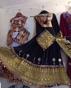 Afghan kuchi traditional dress is made of good quality long lasting fabric with beautiful embriodary Traditionally such Afghanistan new design frocks are used as bridal dress. Most of girls also like and recommend such dresses for wedding, Nikkah and Mehndi night events. The dress measurements are kept average. If you need this frock in exact measurements you need, then please send us measurements which best fit on your body Traditional Maxi Embroidered Dress With Dabka, Traditional Embroidered Maxi Dress With Dabka, Traditional Maxi Choli With Intricate Embroidery, Eid Dresses With Traditional Black Patterns, Traditional Black Ceremonial Dress, Black Dresses With Traditional Patterns For Eid, Black Dresses With Traditional Patterns For Festive Occasions, Black Festive Dresses With Traditional Patterns, Festive Black Dresses With Traditional Patterns