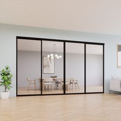 an empty living room with sliding glass doors