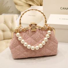 Brand Name: Kylethomasw Handbags Type: TotesMain Material: PolyesterLining Material: PolyesterShape: Square Pink Large Capacity Evening Bag, Pink Handheld Satchel With Large Capacity, Luxury Large Capacity Pink Shoulder Bag, Pink Large Capacity Handheld Satchel, Beige Large Capacity Party Bag, Trendy Top Handle Bag With Pearl Handle, Top Handle Bag With Pearl Handle, Trendy Bags With Pearl Handle, Shopping Bag With Pearl Top Handle