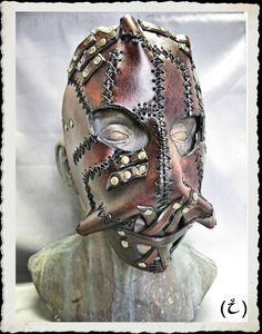 This unique and fully handmade mask is made of 6-7 oz veg tanned leather dyed with a warm dark-brown, treated with a leather satin acrylic finisher. Leather straps, black stiches and bronze plated rivets adorns this creation. The buffalo leather strap have a roll buckle made from steel and brass plated. It's long enough to any size of head or top hat, attached to the frame with brass plated rivets. Extralong straps are available, just ask for it. If you have any question or want something simila Fantasy Leather Masks And Prosthetics For Halloween, Halloween Fantasy Leather Masks And Prosthetics, Cool Leather Mask, Leather Mask Strap, Leather Masks, Handmade Mask, Horse Mask, Costume Masks, Leather Mask