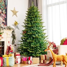 a christmas tree with presents around it