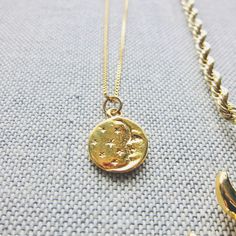 A dainty little layering piece or an awesome stand-alone, everyday necklace. Genuine gold vermeil pendant with a crescent moon and stars on a light-catching and delicate gold fill box chain make this the perfect celestial gift. - MADE TO LAST: Chain is high quality gold fill. Pendant is gold vermeil, a thick layer of gold over sterling silver. The pendant is stamped with the sterling mark .925 on the back. - THE PERFECT GIFT: Comes lovingly packaged with my card and gift box. I'm also happy to w Moon And Stars Necklace, Moon Necklace Gold, Crescent Moon Necklace Gold, Stars Necklace, Celestial Gifts, Baby Barn, Gold Moon Necklace, Star Necklace Gold, Celestial Necklace