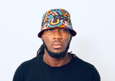 Size: 24 inches in diameter Reversible African print bucket hat Print: Makossa Teal and Aisha Multicolor Reversible Cotton Bucket Hat, Reversible Multicolor Bucket Hat, Reversible Multicolor Cotton Bucket Hat, Casual Multicolor Reversible Sun Hat, Casual Multicolor Reversible Bucket Hat, Casual Multicolor Reversible Hat, Trendy Reversible Multicolor Sun Hat, Trendy Multicolor Reversible Sun Hat, Multicolor Reversible Cap