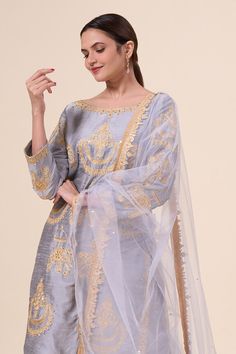 Grey kurta with aari thread embroidered animal motifs and sequin embellishments. Comes with salwar and dupatta. - Aza Fashions Diwali Gold Embroidery Straight Kurta Salwar Kameez, Diwali Salwar Kameez With Gold Embroidery, Diwali Gold Embroidery Straight Salwar Kameez, Chanderi Salwar Kameez With Gold Embroidery, Anarkali Salwar Kameez With Gold Embroidery For Eid, Traditional Raw Silk Salwar Kameez With Gold Embroidery, Anarkali Kurta With Gold Embroidery For Eid, Eid Anarkali Kurta With Gold Embroidery, Eid Sharara With Gold Embroidery Semi-stitched