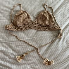 New Never Worn, Handmade Crochet Bikini Bralette In S/M. Cotton Crochet Decorates This Handmade Bralette Style Bikini Top. Ties In The Back. Fabric: 100% Cotton Care: Hand Wash. Beige Triangle Crochet Top For Summer, Beach Crochet Top In Brown, Beach Brown Crochet Top, Seamless Crochet Top For Summer Vacation, Brown Crochet Beach Top, Brown Crochet Top For Beach, Fitted Beige Crochet Top For Beachwear, Triangle Crochet Top For Beach, Triangle Crochet Top For Beach Season