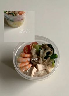 a plastic bowl filled with different types of food on top of a white countertop