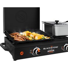 an electric griddle grill with food cooking on the top and side burners in front