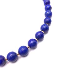 Introducing our striking chunky round lapis beaded collar necklace, a bold and beautiful statement piece that is sure to elevate any outfit. This necklace is handcrafted with reconstituted lapis beads to create a stunning collar design. The 10mm lapis bead size gives the necklace a substantial weight and presence that is both dramatic and eye-catching. The collar design of this necklace sits beautifully around the neck, and the adjustable length ensures a comfortable and custom fit. The bold des Elegant Lapis Lazuli Beaded Necklaces With Round Beads, Elegant Beaded Necklaces With Round Lapis Lazuli Beads, Royal Blue Lapis Lazuli Necklaces With Round Beads, Elegant Lapis Lazuli Beaded Necklaces, Elegant Lapis Lazuli Beaded Necklace With Round Beads, Elegant Lapis Lazuli Beaded Necklace, Royal Blue Lapis Lazuli Necklace With Round Beads, Formal Lapis Lazuli Necklace With Round Beads, Formal Lapis Lazuli Beaded Necklace