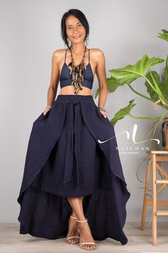 "A comfy, wrap around skirt in a navy blue cotton. This must-have maxi skirt feels as great as it looks, day or night. Gorgeous long skirt that drapes nicely around your body and flies while walking! You wrap the cotton gauze skirt around yourself and close it with the bow. The skirt comes together with the bow around the waist and I've inserted a pocket on each side. Made from a stunning cotton, this skirt is ideal for numerous occasions such as family events, romantic diners, cocktail parties Beach Linen Maxi Skirt, Linen Maxi Skirt For The Beach, Bohemian Linen Maxi Skirt For Beach, Vacation Wide-leg Linen Maxi Skirt, Navy Cotton Summer Skirt, Beach Linen Wide Leg Maxi Skirt, Linen Wide-leg Maxi Skirt For Beach, Navy Flared Skirt For Summer, Summer Navy Flared Skirt