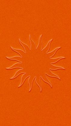 an orange background with a circular design in the center