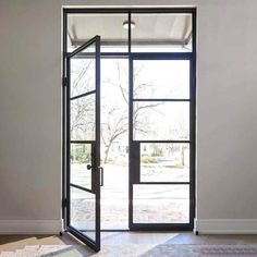 an open glass door in a room