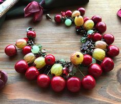 Red Cherry Gooseberry bracelet with onyx & coral Summer berry bright jewelry Garden Nature Botanical Handmade Cherry Colored Round Bead Jewelry, Elegant Handmade Red Charm Bracelet, Elegant Red Handmade Charm Bracelet, Unique Red Jewelry With Charms, Red Bohemian Charm Bracelet For Gift, Red Dangle Bracelets As Gift, Bohemian Style Red Charm Bracelet For Gift, Unique Red Beaded Bracelets For Gift, Unique Red Bracelet For Gift