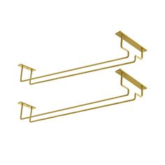 two gold metal shelf brackets against a white background