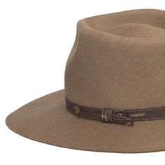 ↑ Click above to watch the video! ↑ Midtown is a sturdy wool fedora with a tall blocked teardrop crown that features a genuine leather hatband, a wide flat brim, and an adjustable sweatband. Perfect for your favorite fall outfit. Material: 100% WoolBrim: 3 1/2"Crown: 4 1/2 teardropHatband: 5/8 leatherClimate: Cold Hand-finished in the US. If your measurement falls between sizes, choose the next largest size. A looser fit is recommended as you can use hat size reducer tape to help nail the perfec Classic Flat Crown Hat Bands For Fall, Brown Felt Hat With Flat Crown For Fall, Western Style Fedora For Fall, Western Fedora For Everyday Fall Wear, Western Style Fedora For Everyday Fall Wear, Western Style Everyday Fedora For Fall, Classic Leather Hat Bands For Fall, Classic Brown Felt Hat For Everyday, Leather Felt Hat With Flat Brim For Fall