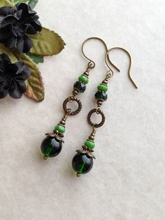 Elegant Green Hypoallergenic Beaded Earrings, Elegant Green Czech Glass Earrings, Elegant Green Long Drop Beaded Earrings, Hypoallergenic Green Round Bead Earrings, Vintage Green Czech Glass Earrings, Vintage Green Beaded Earrings, Vintage Green Beaded Earrings With Round Beads, Dark Green Earrings, Victorian Style Earrings