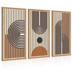 three framed art pieces with different shapes and sizes on the sides, each featuring an abstract design