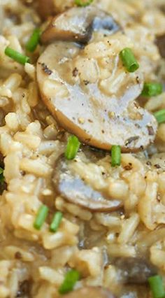 rice with mushrooms and green onions in a bowl