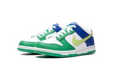 The Nike Dunk Low GS "Green/Blue" is the youth sizing of the classic basketball shoe in a colorway with unique green and blue color blocking.  Released exclusively in kids sizing, the “Green/Blue” Dunk Low has a white leather base with Stadium Green leather overlays on the toe cap, forefoot, and eyelets.  Game Royal leather panels are seen on the collar and heel.  A Lemon Twist-colored leather Swoosh appears on the mid-panel.  “Nike” branding is located on both the heel and tongue tag.  Release date: August 1, 2023 Jordan Golf, Green Branding, Nike X Travis Scott, Lemon Twist, Nike Branding, Yellow Nikes, Jordans Women, Nike Brand, Cute Sneakers