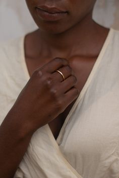 14k recycled gold-plated brass Nickel & lead free Crafted using responsibly sourced and recycled metals Handmade in a solar-powered workshop in rural Malawi The 'Chalu' Ring (meaning 'natural earth' in Tumbuka) is crafted with a wabi-sabi organic design in mind, giving it a rustic, natural feel. The irregular beauty is sure to make a statement, perfect for a special occasion or everyday wear. Crafted from brass coated in a luxuriously thick layer of 14k recycled gold to ensure both longevity and Heirloom Style Everyday Stackable Rings In Recycled Gold, Gold Hand Forged Ring For Everyday, Everyday Hammered Recycled Gold Rings, Minimalist Handmade Rings In Recycled Gold, Hand Forged Gold Rings For Everyday, Hammered Recycled Gold Ring, Minimalist Recycled Gold Toe Ring, Dainty Hand Forged Rings For Everyday, Hand-forged Ring Jewelry For Everyday