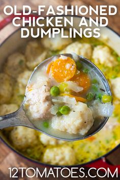 a ladle full of chicken and dumplings with peas