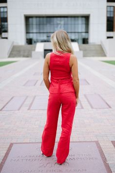 Elevate your style with our Shannon Linen Set in Red! This two piece set includes a sleeveless square neck top with a partial button down front and back tie, paired with high waisted pants. Perfect for a day out, the vibrant red color will make you stand out while the lightweight linen fabric will keep you comfortable. Give your wardrobe a pop of color and sophistication with our Shannon Linen Set! 100% linen inseam: 31.5" Model is 5'6" with a 34" bust, 27" waist, and 36" hips and wearing a smal Red Sleeveless Two-piece Set, Red Wide Leg Summer Sets, Red Wide Leg Sets For Summer, Casual Red Wide Leg Sets, Loungewear Summer, Shoes Sandals Heels, Square Neck Top, Linen Set, Dresses By Length