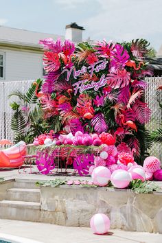 a pink and green tropical themed birthday party