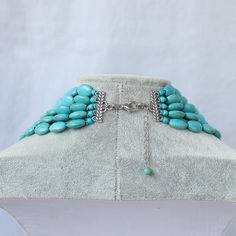 "Material: Howlite Turquoise Bead size: 12*16mm Necklace size: 18\"-24\" + 2\" extension chain Color: turquoise Packing: Beautiful Pouch All items in my shop are made to order. Most of the time it takes 1-3 business days but can be longer at times and for larger orders. If you want to order of different style. Please contact me . ----------------------------------------------------- Please feel free to convo me should you have any question! Thank you! :)" Handmade Adjustable Turquoise Bib Necklace, Handmade Turquoise Bib Necklace With Adjustable Fit, Adjustable Turquoise Necklace With Round Beads, Adjustable Multi-strand Turquoise Necklace Gift, Turquoise Bib Necklace With Round Beads For Gifts, Multi-strand Turquoise Necklace For Gifts, Turquoise Multi-strand Necklace For Gift, Turquoise Multi-strand Necklace For Jewelry Making, Boyfriend Girlfriend Necklaces