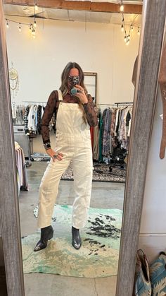 Stay warm and stylish this winter with our Winter White Overalls. Made from light weight white denim, these carpenter style overalls feature adjustable straps and a small barrel design. Perfect for a casual day out or a chilly night in, these overalls are a must-have addition to your wardrobe.