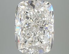 a cushion - cut diamond is shown in the middle of its frame, and it appears to be very large